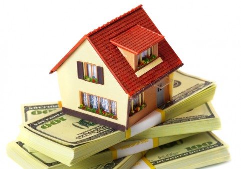 house on packs of banknotes