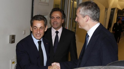 Nicolas Sarkozy, Bruno Le Maire et Luc Chatel, le 1er décembre au siège de l'UMP à Paris. REUTERS/Jacky Naegelen